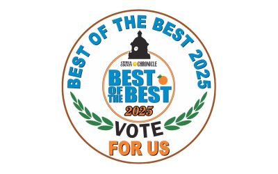 Circular badge with "Best of the Best 2025" at the center. Citrus County Chronicle logo above, surrounded by "Best of the Best 2025" in blue text. Below, "Vote for Us" in bold letters, with decorative green laurel leaves.
